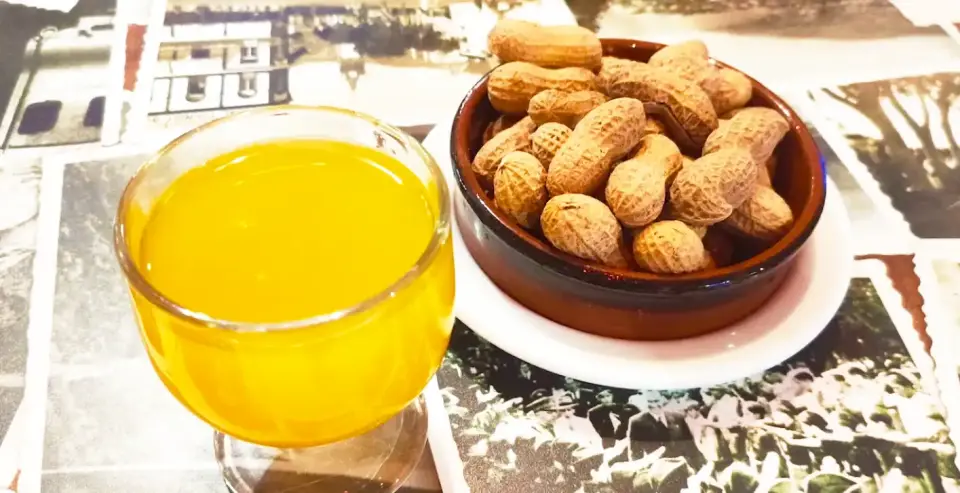Glasses of freshly mixed poncha on a bar counter in Madeira